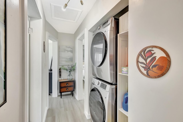 115 W 31st Ct, Riviera Beach, FL 33404 - laundry area with stacked washer / dryer and laundry area