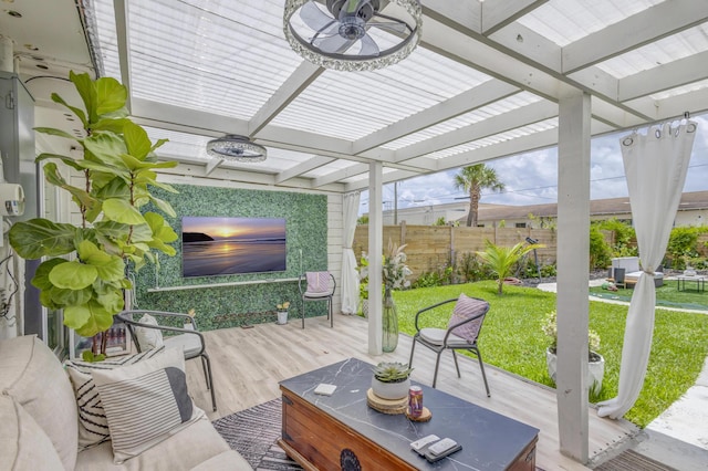 115 W 31st Ct, Riviera Beach, FL 33404 - wooden deck featuring a yard, a pergola, and fence