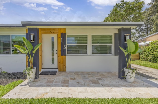 115 W 31st Ct, Riviera Beach, FL 33404 - view of front of property with stucco siding