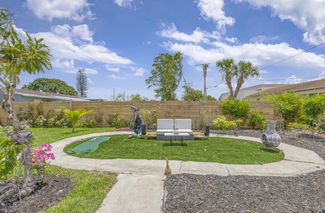 115 W 31st Ct, Riviera Beach, FL 33404 - view of yard featuring a fenced backyard