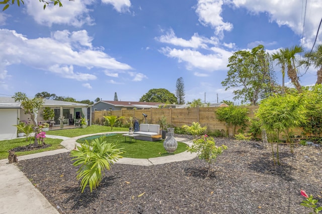115 W 31st Ct, Riviera Beach, FL 33404 - view of yard with outdoor lounge area, a patio area, and a fenced backyard