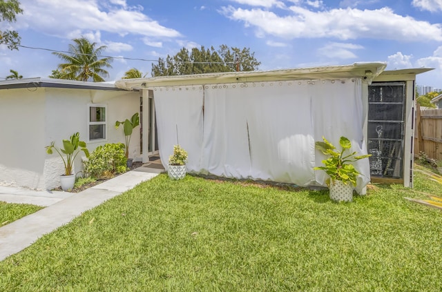 115 W 31st Ct, Riviera Beach, FL 33404 - view of outdoor structure featuring fence
