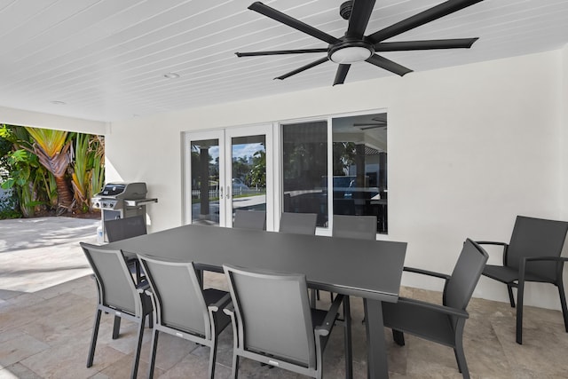 2500 NE 23rd St, Pompano Beach, FL 33062 - view of patio featuring french doors, a ceiling fan, outdoor dining space, and grilling area