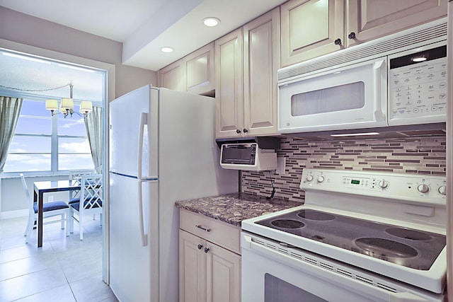 2121 N Ocean Blvd Unit 1707E, Boca Raton, FL 33431 - kitchen with white appliances, backsplash, a chandelier, light tile patterned floors, and recessed lighting