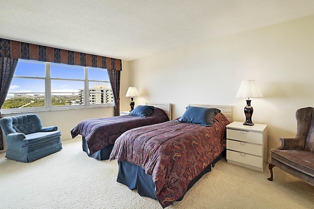 2121 N Ocean Blvd Unit 1707E, Boca Raton, FL 33431 - bedroom featuring carpet floors and a textured ceiling