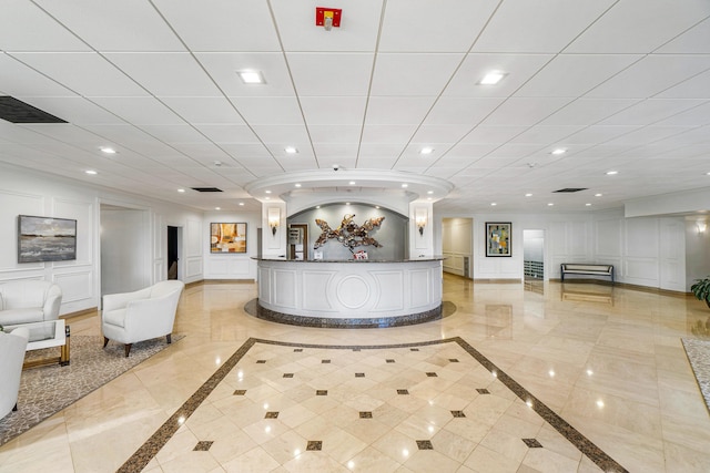 2121 N Ocean Blvd Unit 1707E, Boca Raton, FL 33431 - reception area with a decorative wall and recessed lighting