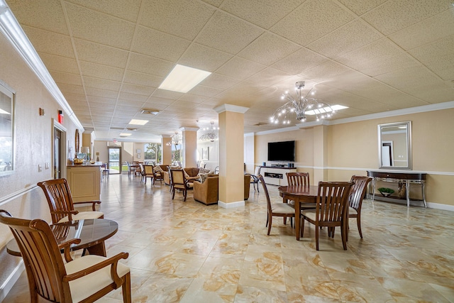 2121 N Ocean Blvd Unit 1707E, Boca Raton, FL 33431 - dining room featuring crown molding, a chandelier, decorative columns, and baseboards