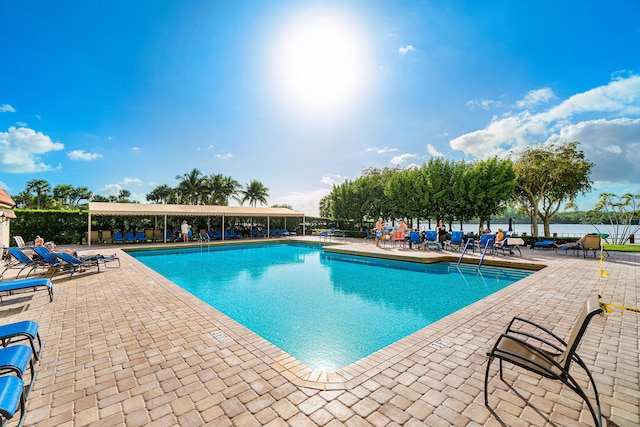 2121 N Ocean Blvd Unit 1707E, Boca Raton, FL 33431 - community pool featuring a patio area and fence