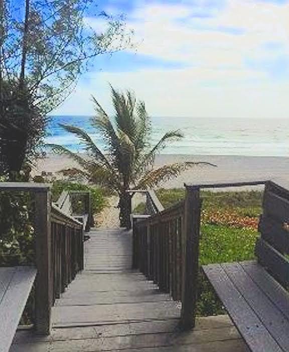 2121 N Ocean Blvd Unit 1707E, Boca Raton, FL 33431 - wooden deck with view of water and beach