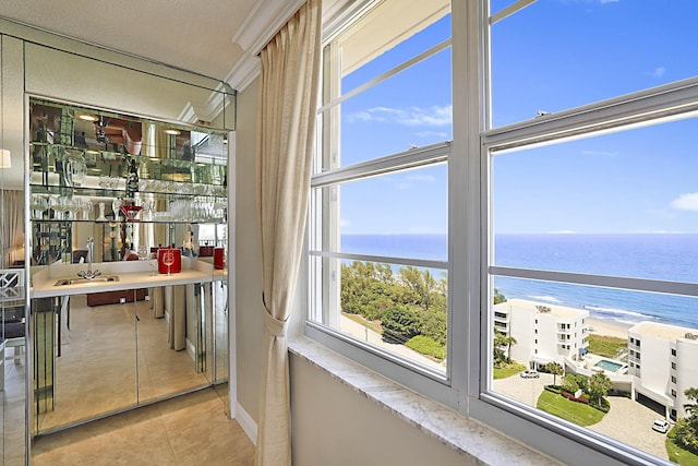 2121 N Ocean Blvd Unit 1707E, Boca Raton, FL 33431 - interior space with a water view, plenty of natural light, and light tile patterned floors