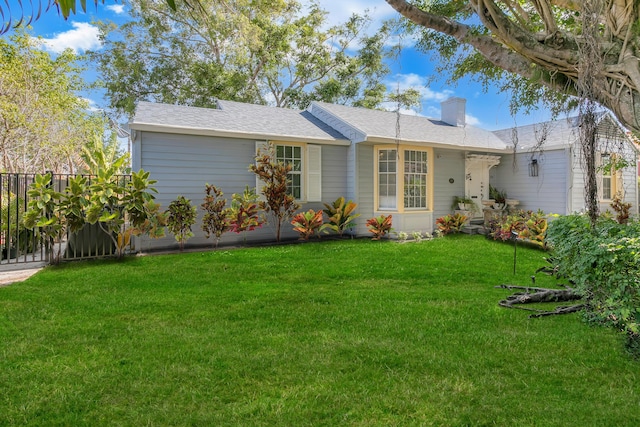 335 Monroe Dr, West Palm Beach, FL 33405 - ranch-style home featuring a chimney