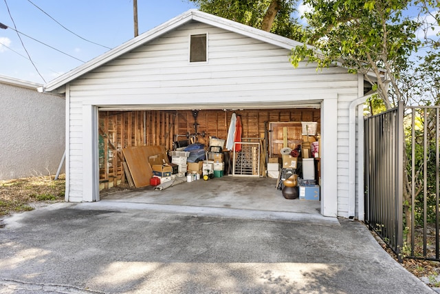 335 Monroe Dr, West Palm Beach, FL 33405 - detached garage featuring fence
