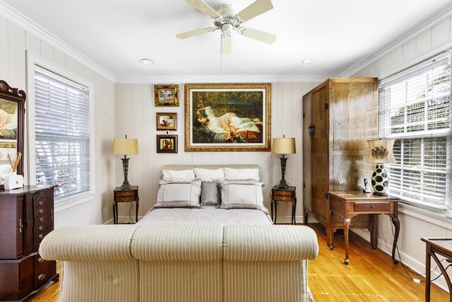 335 Monroe Dr, West Palm Beach, FL 33405 - bedroom with crown molding, light wood finished floors, baseboards, and a ceiling fan