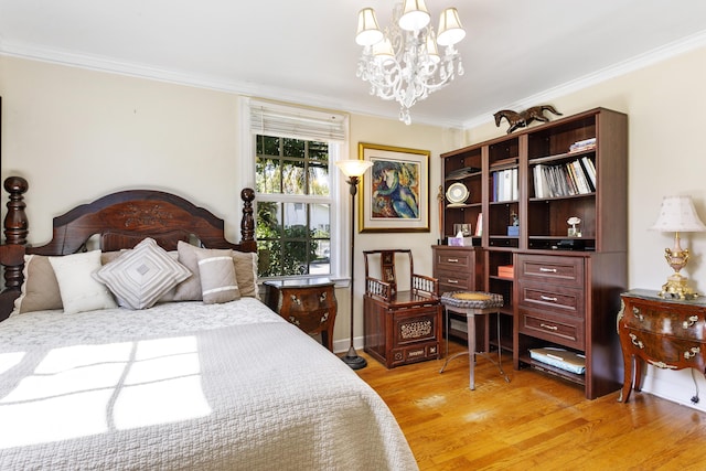 335 Monroe Dr, West Palm Beach, FL 33405 - bedroom featuring a chandelier, crown molding, and light wood-style flooring