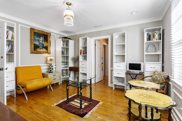 335 Monroe Dr, West Palm Beach, FL 33405 - office space with wood finished floors, crown molding, a chandelier, and built in features