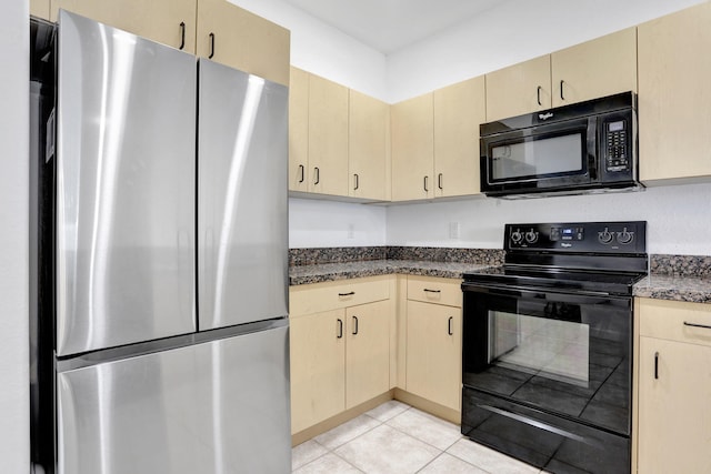 3599 NW 14th Ct, Lauderhill, FL 33311 - kitchen featuring black appliances, light tile patterned flooring, dark stone countertops, and light brown cabinets