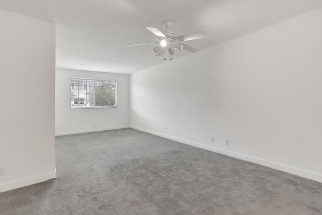 3599 NW 14th Ct, Lauderhill, FL 33311 - empty room with carpet, ceiling fan, and baseboards