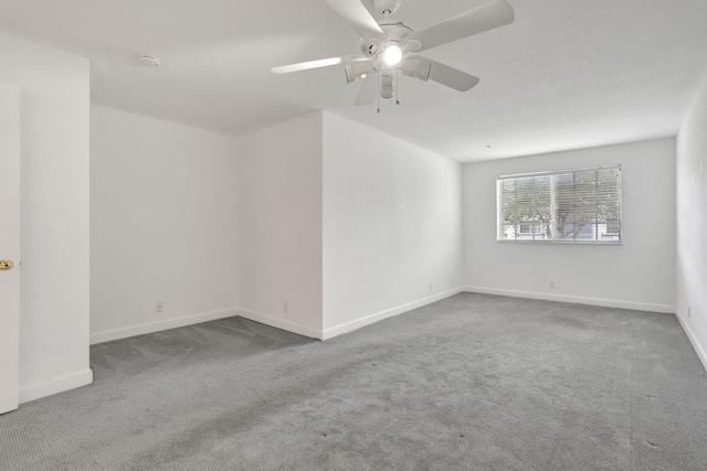 3599 NW 14th Ct, Lauderhill, FL 33311 - spare room with carpet, ceiling fan, and baseboards