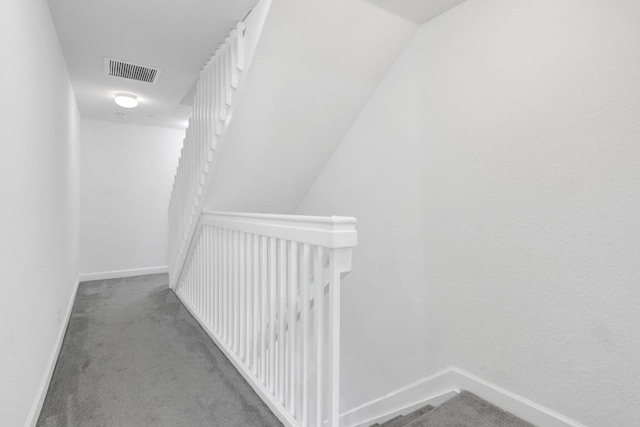 3599 NW 14th Ct, Lauderhill, FL 33311 - hallway with an upstairs landing, baseboards, and carpet