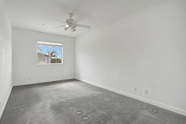 3599 NW 14th Ct, Lauderhill, FL 33311 - carpeted spare room with baseboards and a ceiling fan