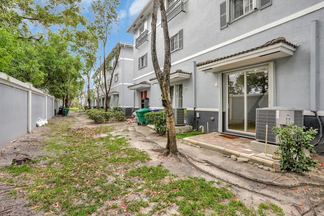 3599 NW 14th Ct, Lauderhill, FL 33311 - view of yard featuring central air condition unit and fence