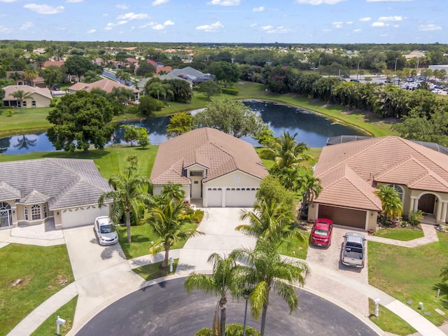 1235 SW Briarwood Dr, Port Saint Lucie, FL 34986 - aerial perspective of suburban area featuring a large body of water