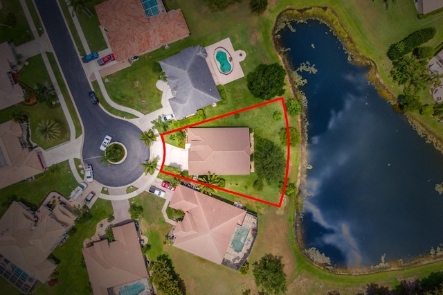 1235 SW Briarwood Dr, Port Saint Lucie, FL 34986 - aerial view of property and surrounding area featuring a nearby body of water and property parcel outlined