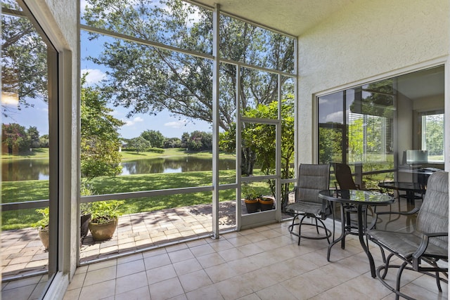1235 SW Briarwood Dr, Port Saint Lucie, FL 34986 - sunroom featuring a water view