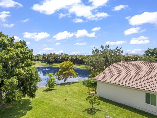 1235 SW Briarwood Dr, Port Saint Lucie, FL 34986 - view of green lawn with a water view