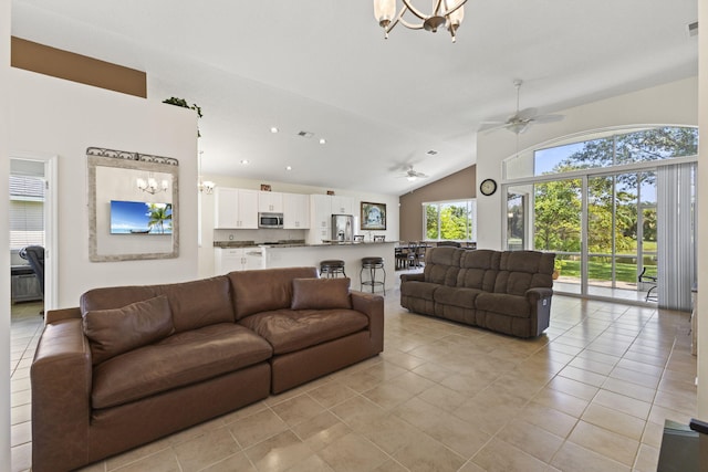 1235 SW Briarwood Dr, Port Saint Lucie, FL 34986 - living room featuring a chandelier, light tile patterned flooring, ceiling fan, high vaulted ceiling, and recessed lighting
