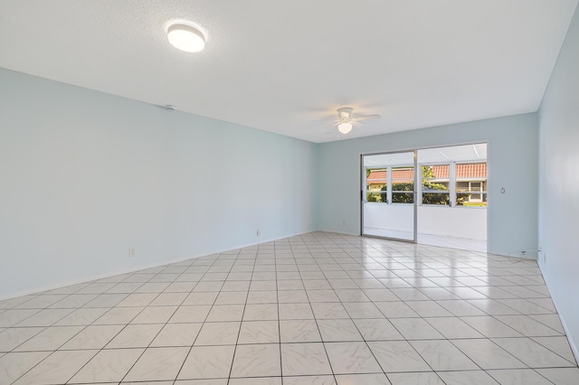 unfurnished room with a ceiling fan