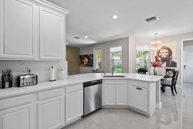 111 Tullamore Ave, Jupiter, FL 33458 - kitchen featuring dishwasher, a sink, a peninsula, a chandelier, and recessed lighting