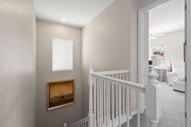 111 Tullamore Ave, Jupiter, FL 33458 - corridor with an upstairs landing and carpet floors