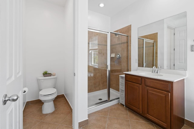 111 Tullamore Ave, Jupiter, FL 33458 - bathroom with tile patterned floors, a stall shower, and toilet