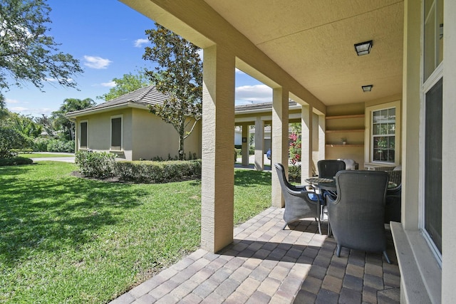 111 Tullamore Ave, Jupiter, FL 33458 - view of patio / terrace with outdoor dining area