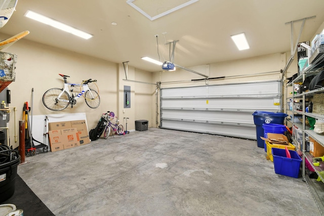 111 Tullamore Ave, Jupiter, FL 33458 - garage featuring a garage door opener and electric panel