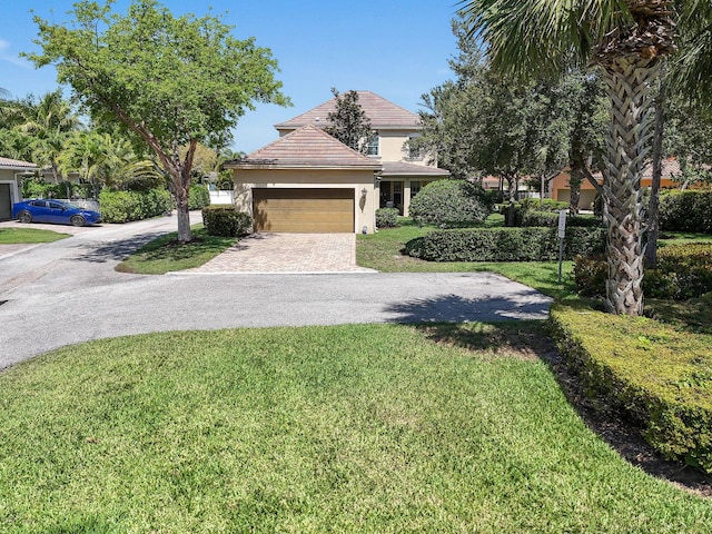 111 Tullamore Ave, Jupiter, FL 33458 - view of property hidden behind natural elements with driveway, a front lawn, stucco siding, a garage, and a tile roof
