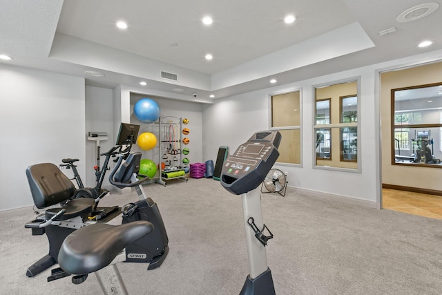 111 Tullamore Ave, Jupiter, FL 33458 - exercise room featuring recessed lighting, carpet, a tray ceiling, and baseboards