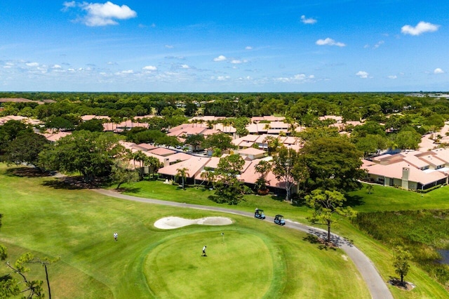 aerial perspective of suburban area featuring a golf course