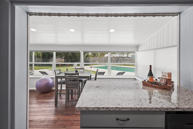 764 Westwind Dr, North Palm Beach, FL 33408 - kitchen featuring dark wood-style flooring, light stone counters, and recessed lighting
