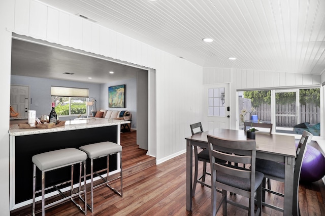 764 Westwind Dr, North Palm Beach, FL 33408 - dining space with hardwood / wood-style floors, baseboards, recessed lighting, and wood ceiling