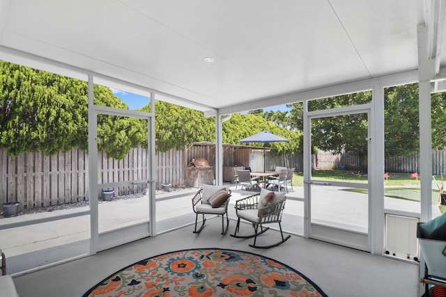 764 Westwind Dr, North Palm Beach, FL 33408 - sunroom / solarium with outdoor dining space and healthy amount of natural light