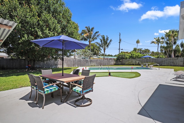 764 Westwind Dr, North Palm Beach, FL 33408 - view of patio / terrace featuring outdoor dining area