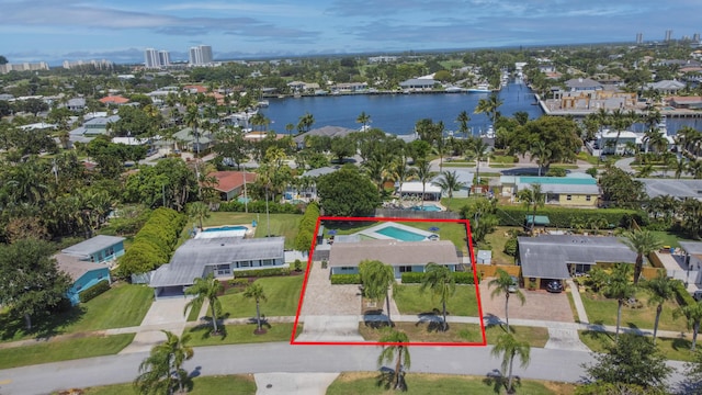 764 Westwind Dr, North Palm Beach, FL 33408 - aerial view of residential area featuring property boundaries highlighted and a large body of water