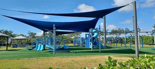 764 Westwind Dr, North Palm Beach, FL 33408 - community play area featuring a yard