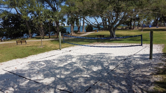 764 Westwind Dr, North Palm Beach, FL 33408 - view of community with volleyball court and a lawn