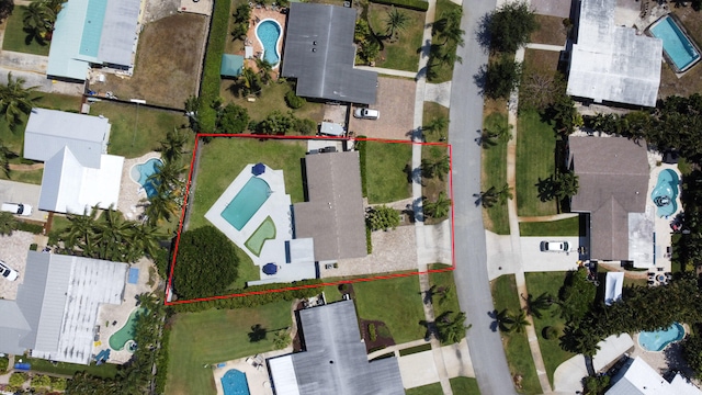 764 Westwind Dr, North Palm Beach, FL 33408 - aerial overview of property's location with property boundaries highlighted and a pool area