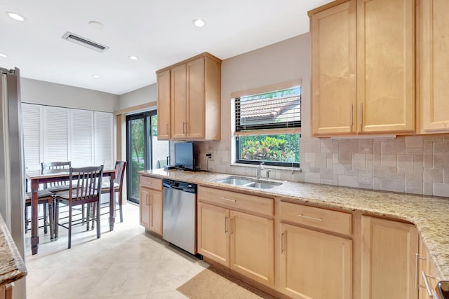 8030 Eastlake Dr Unit 10B, Boca Raton, FL 33433 - kitchen featuring stainless steel dishwasher, light brown cabinets, a sink, tasteful backsplash, and recessed lighting