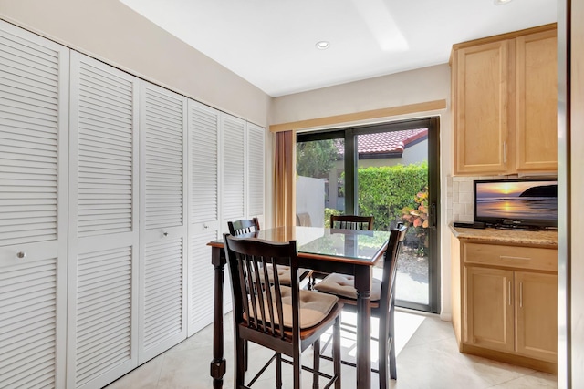 8030 Eastlake Dr Unit 10B, Boca Raton, FL 33433 - dining room featuring light tile patterned flooring and recessed lighting