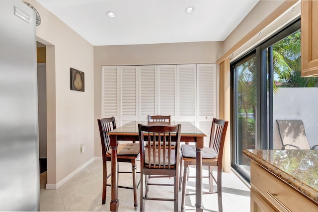 8030 Eastlake Dr Unit 10B, Boca Raton, FL 33433 - dining room with recessed lighting, baseboards, and light tile patterned floors